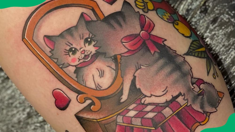 Mirror image cat tattoo