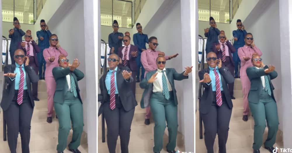 TikTok user @pearltwins2 and other women dancing in suits