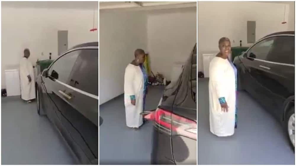 Nigerian woman surprised at seeing Tesla Car