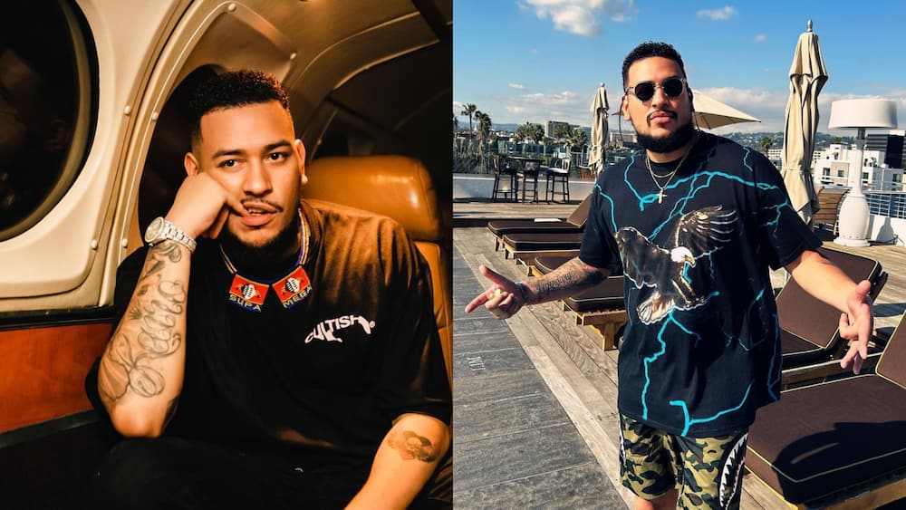 Rapper AKA posing for the camera in black tees