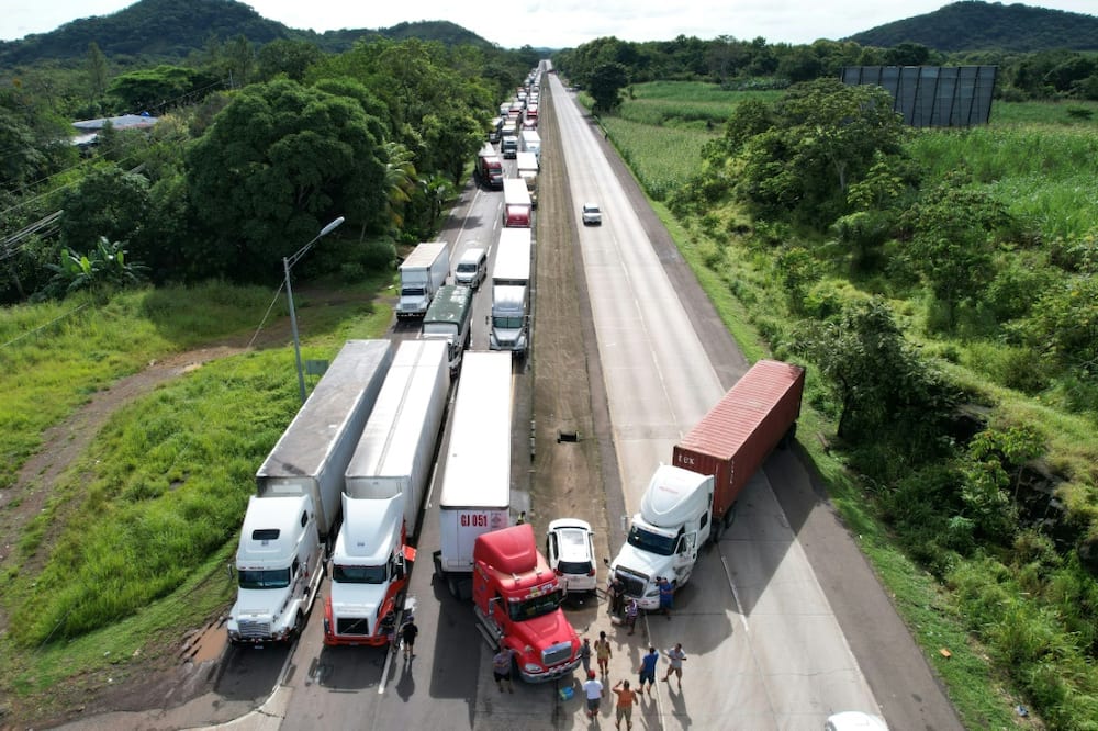 Trucks block the Panamerican Highway in Santiago de Veraguas, Panama on July 15, 2022 amid protests over fuel and food prices