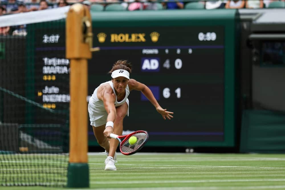 Germany's Tatjana Maria in action against compatriot Jule Niemeier in the Wimbledon quarter-finals