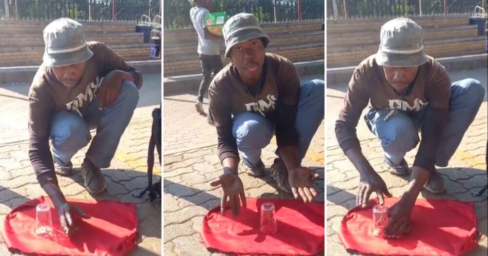 Mzansi man doing cool coin trick on the street