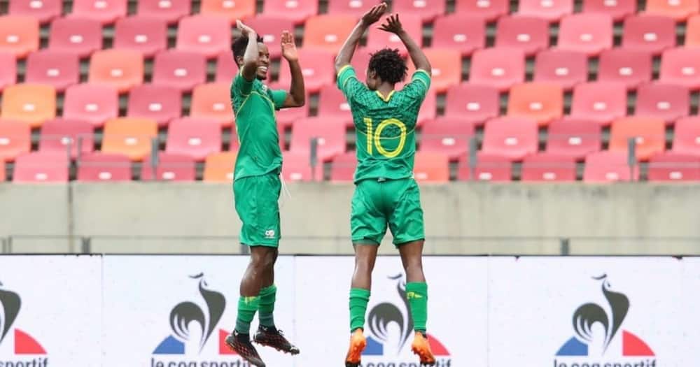 Bafana Bafana striker Percy Tau (right) wants to help the team qualify for Afcon next year. Image: Twitter