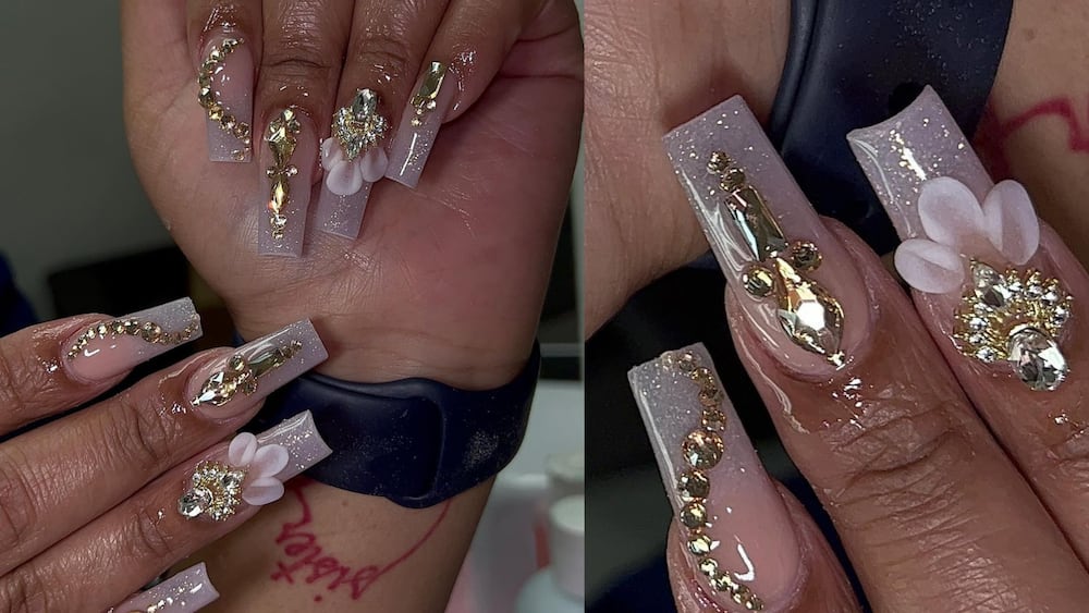 Clear nails with gold bling and white florals