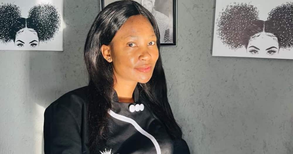 The woman in the North West province has a hair salon and is proud of herself