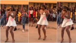 Lady wows with amazing legwork in heels while surrounded by people