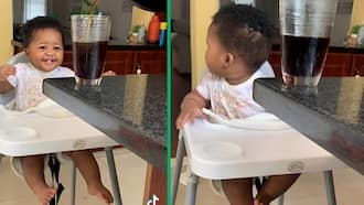 Mzansi mom's Coke challenge with baby goes TikTok viral