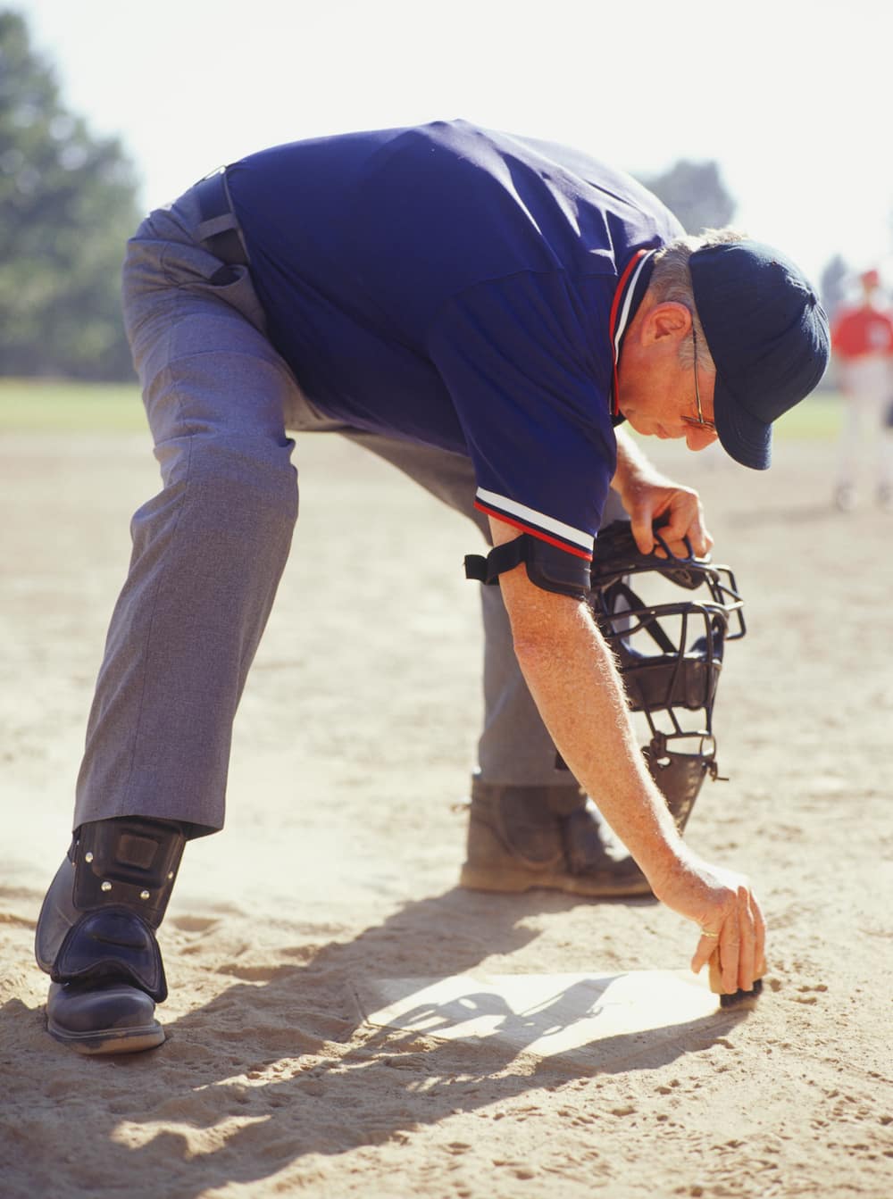 Major League umpire Erich Bacchus looks on during the game between News  Photo - Getty Images