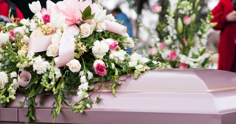 Picture of a casket at a funeral