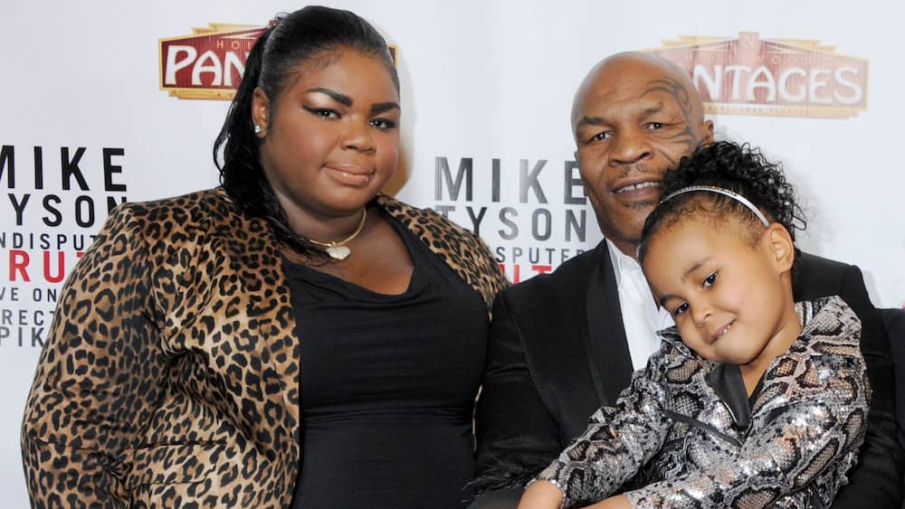 Tyson with daughters Mikey and Milan in 2013