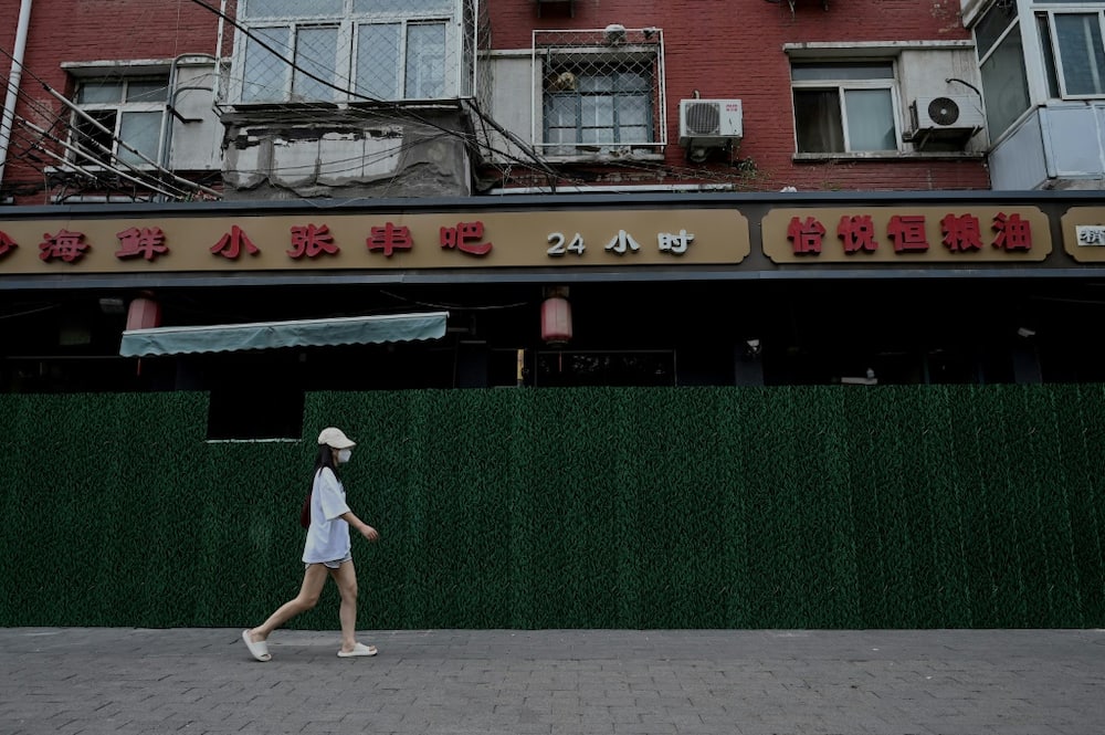 China's adherence to a zero-Covid strategy leaves firms and workers at risk of snap lockdowns