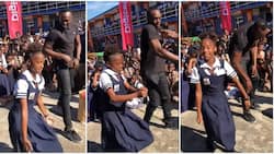 Cute school kid with flexible body takes on Usain Bolt in marathon dance, twists her body like robot in video