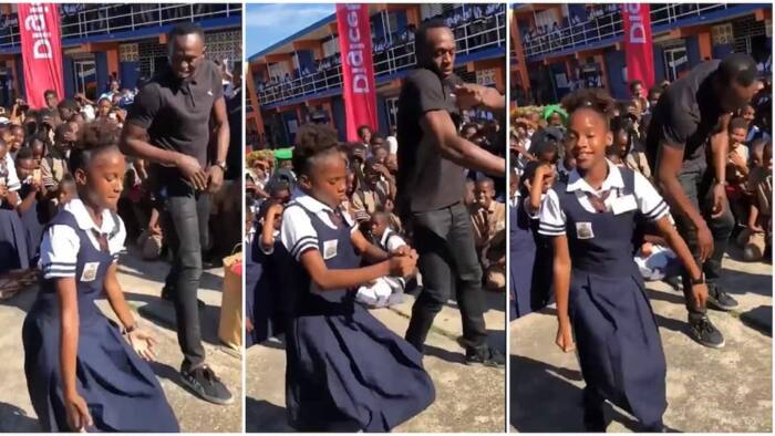 Cute school kid with flexible body takes on Usain Bolt in marathon dance, twists her body like robot in video