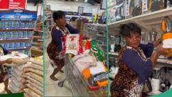 "Smart woman": Lady carries bags of rice and plenty of food items during 30-second free shopping spree