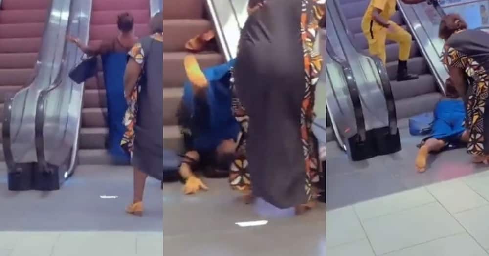 Video clip, woman, failing to get onto escalator, SA giggling.