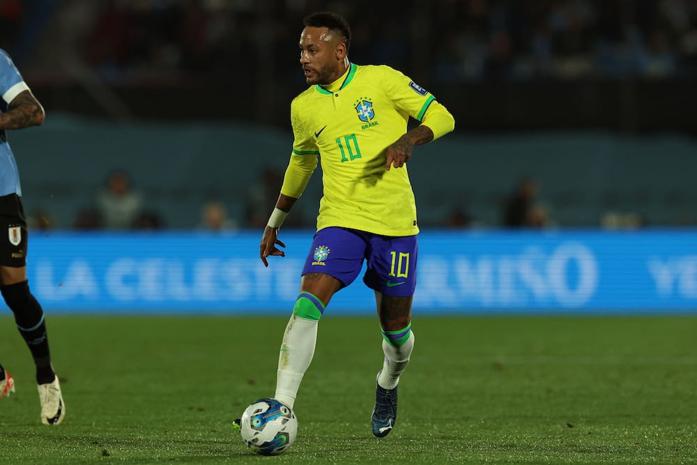 Neymar plays during a match between Brazil and Uruguay