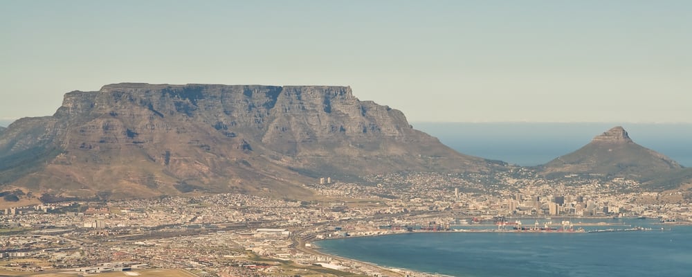 An aerial view of Table Mountain and Lion's Head Peak in Nelson Mandela Bay