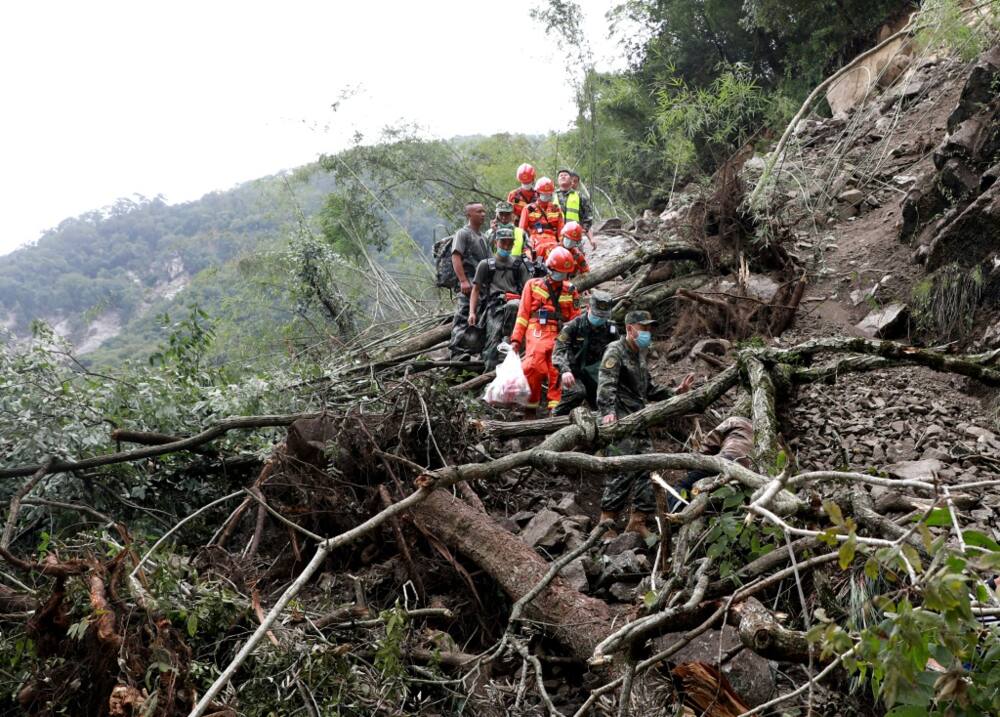 Downpours and mudslides hamper China earthquake rescue mission ...