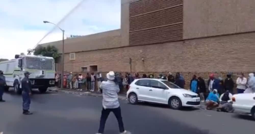 SA responds angrily to cops spraying sick and disabled in SASSA lines