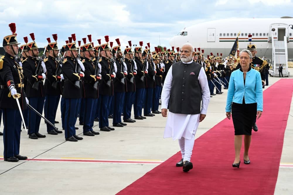 Modi was greeted by French Prime Minister Elisabeth Borne at Orly airport outside Paris