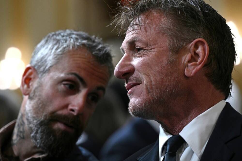 US actor Sean Penn (R) sits next to Officer Michael Fanone of the Washington, DC, Metropolitan Police Department, as they attend the fifth hearing by the House Select Committee to Investigate the January 6 Attack on the US Capitol