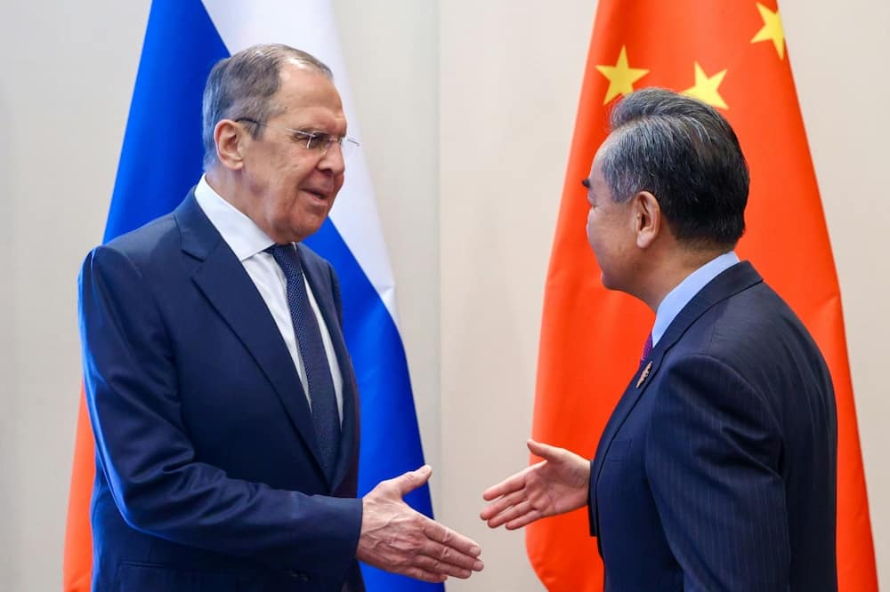 Chinese Foreign Minister Wang Yi met Russian counterpart Sergei Lavrov in Bali Thursday for talks