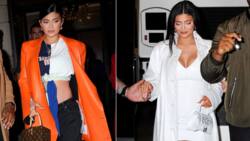 Kylie Jenner shows off growing baby bump: "Let me know before you snap this hard next time"