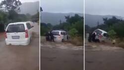 KZN floods: Horrific video shows car swept away after attempting to cross a flooded bridge, Mzansi appalled