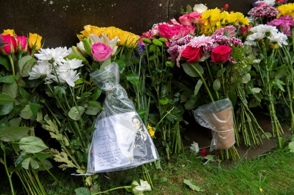 Floral tributes were also left at the queen's Windsor Castle home west of London and outside Holyroodhouse in Edinburgh