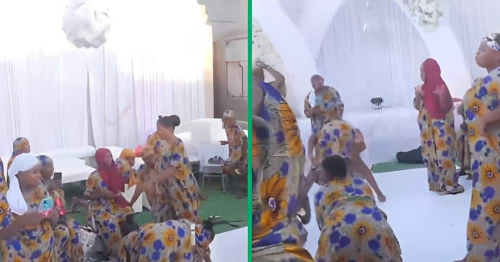 A video shows women twerking in Africa at an event.