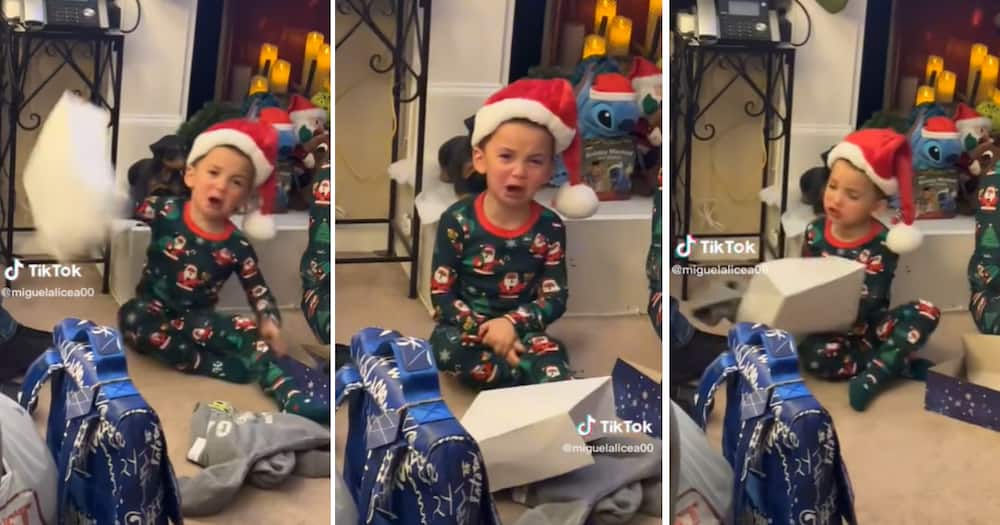 Little boy throwing a tantrum over Christmas clothes