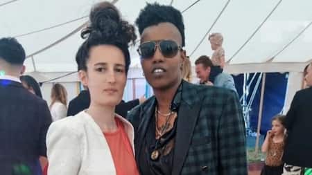 Toya Delazy and wife, Alisson Chaig, celebrate pride month with their newborn child, “Our first family pride”