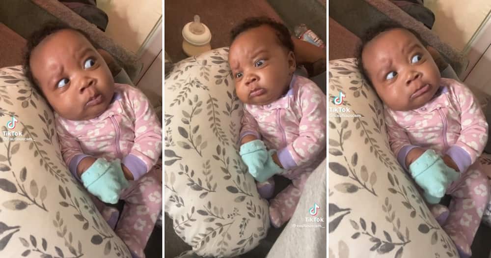 A shady baby gave her dad a bombastic side-eye