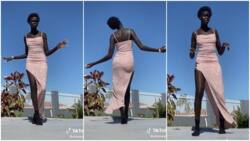 Super tall lady with smooth black skin dances in viral video, height wows many people