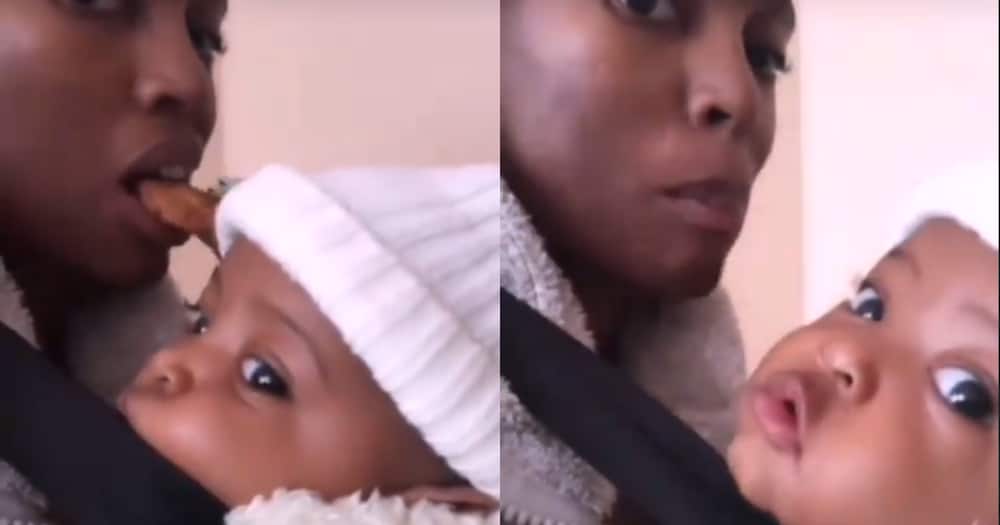 Mom Shares Funny Clip of Trying to Eat Chocolate While Holding Baby