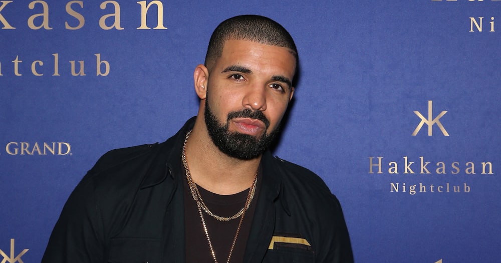 Drake: Woman arrested after being found with weapon outside rapper's home