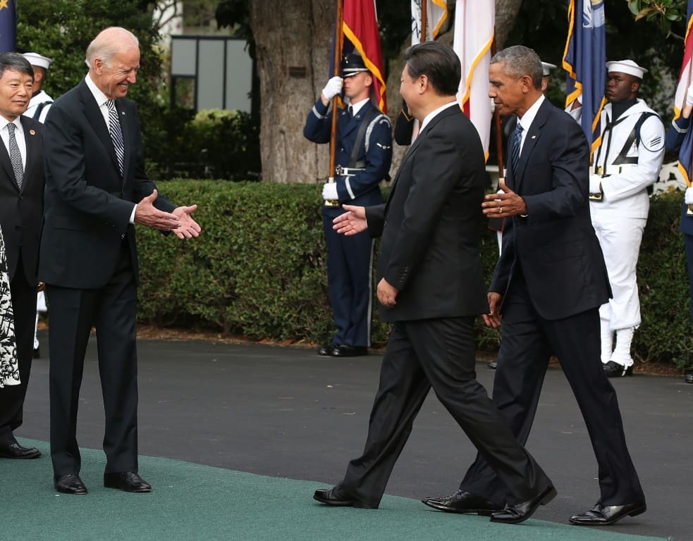 Joseph Biden, then vice president, meeting Chinese leader Xi Jinping (C) at the White House in September 2015 as then US president Barack Obama stands by