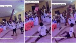 Young man causes stir at event as he holds a bench with only his teeth while doing legwork in video