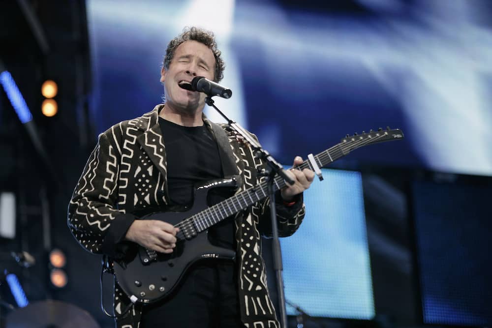 Johnny Clegg performs on stage