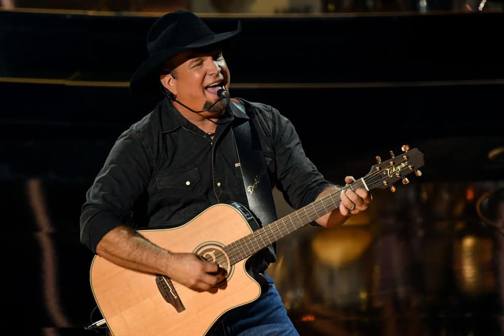 Garth Brooks performs onstage at the 2020 Billboard Music Awards, broadcast