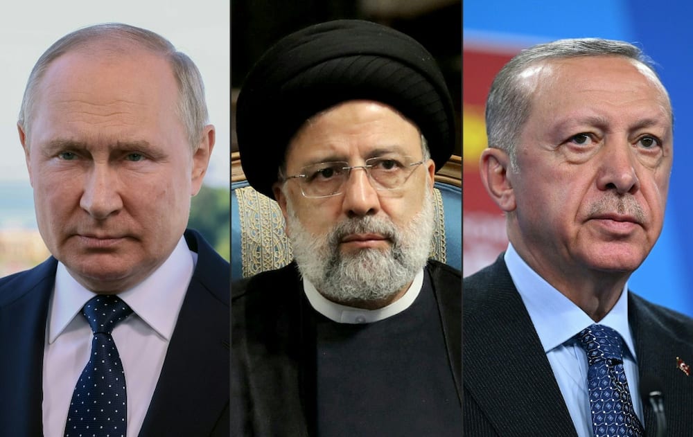 Russian President Vladimir Putin (L), Iranian President Ebrahim Raisi (C) and Turkish President Recep Tayyip Erdogan are due to meet in Tehran on Tuesday