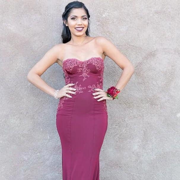 The strapless maroon gown