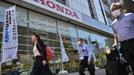Honda posts record profit, issues cautious forecasts