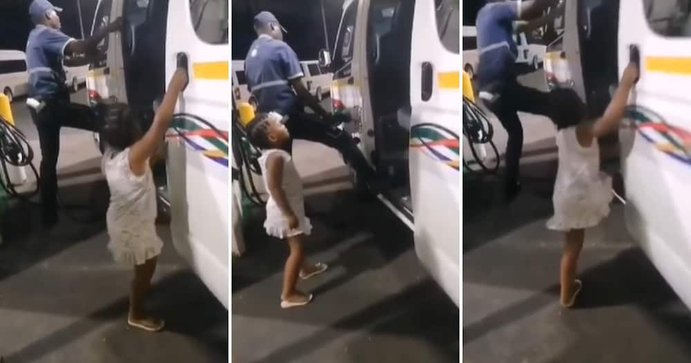 Little girl helping petrol attendant