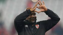 Pitso Mosimane congratulates his Al Ahly charges after a tough game, fans delighted