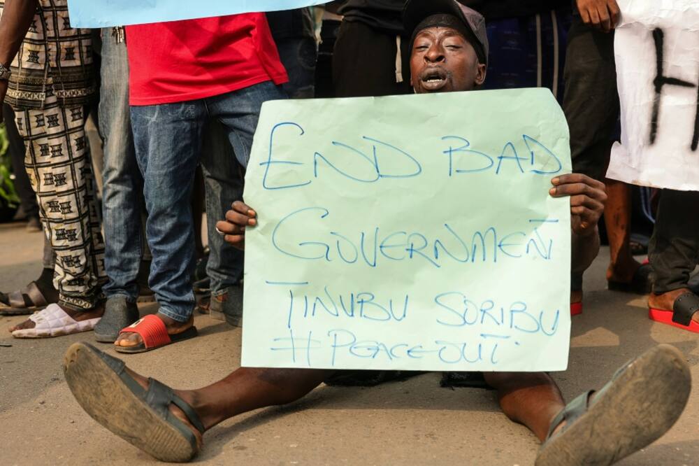 Demonstrators in the southern city of Ibadan carried signs saying 'End bad government', 'End food scarcity' and 'End Nigerian hardship'
