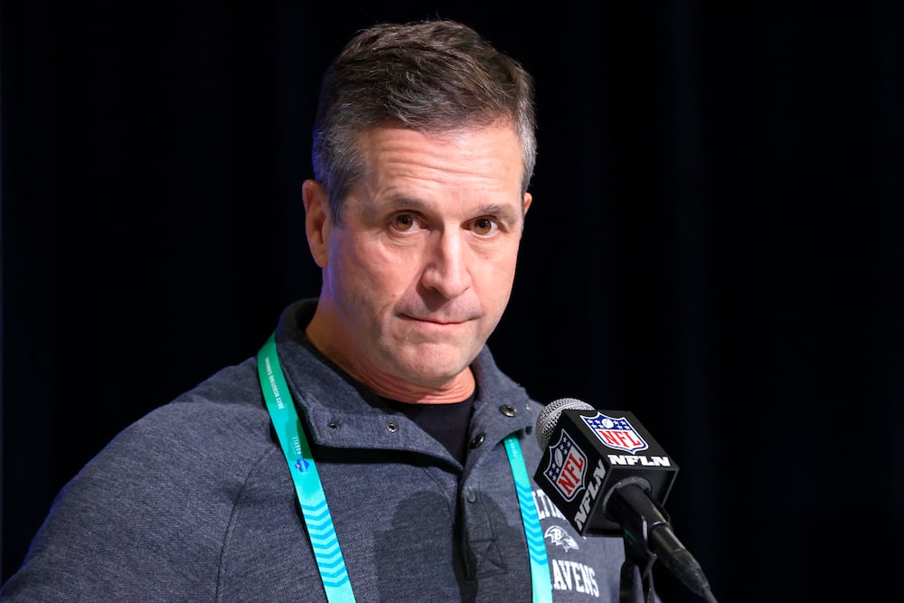 John Harbaugh of the Baltimore Ravens speaks to the media during the NFL Combine
