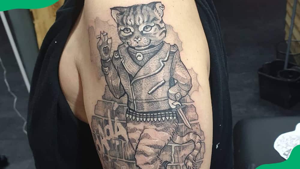 Cat in a jacket tattoo