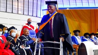 Robbery shooting survivor graduates with degree 14 years after the incident that left him partially paralysed